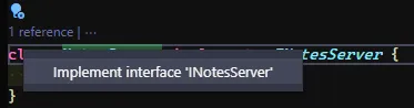 Blue lightbulb showing the automatic interface implementation option in VSCode