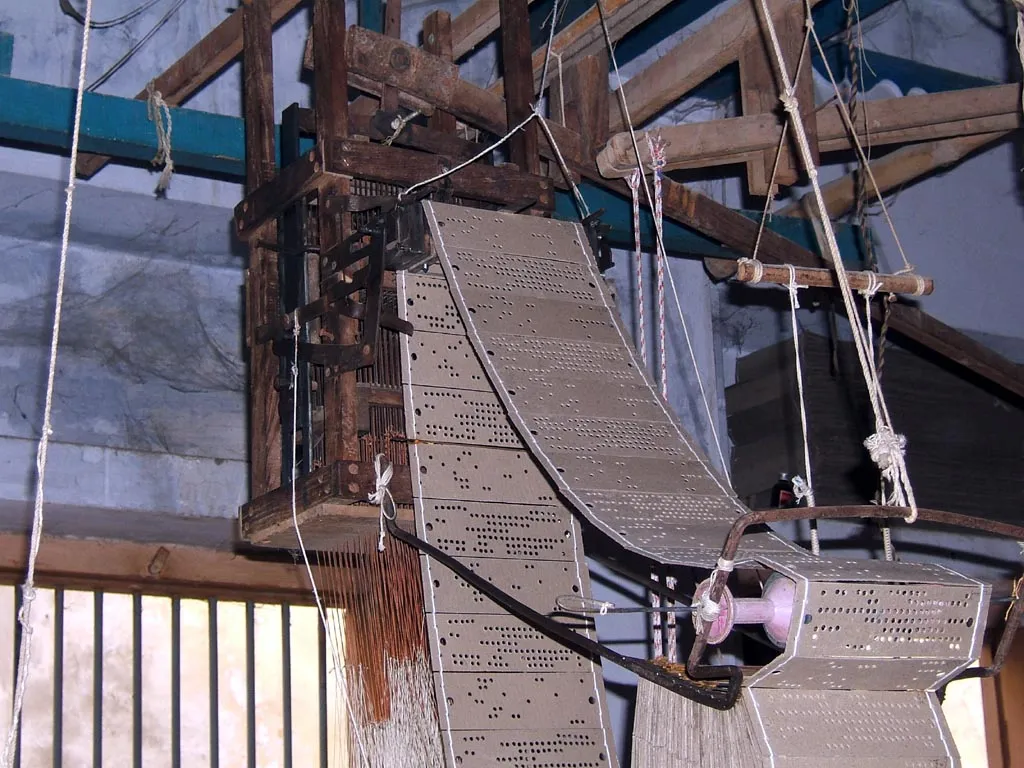 The punched-card control mechanism of a Jacquard loom in use in 2009, Varanasi, Uttar Pradesh, India.